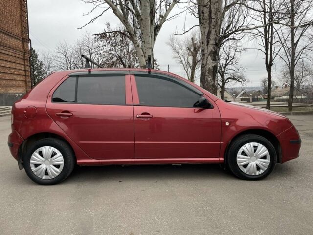 Красный Шкода Фабия, объемом двигателя 1.2 л и пробегом 250 тыс. км за 1650 $, фото 14 на Automoto.ua