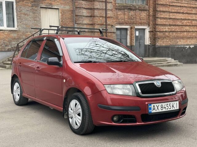 Красный Шкода Фабия, объемом двигателя 1.2 л и пробегом 250 тыс. км за 1650 $, фото 1 на Automoto.ua