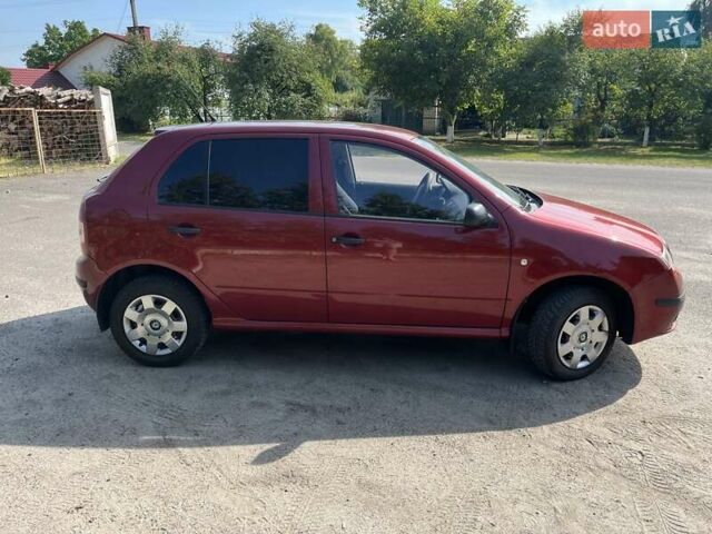 Красный Шкода Фабия, объемом двигателя 1.2 л и пробегом 253 тыс. км за 3750 $, фото 7 на Automoto.ua