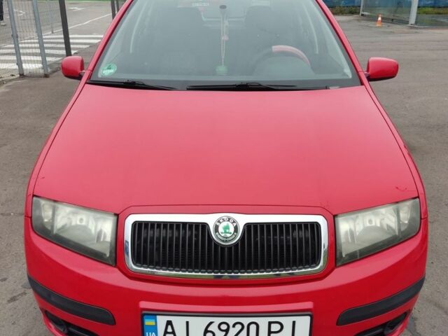 Красный Шкода Фабия, объемом двигателя 1.2 л и пробегом 240 тыс. км за 4200 $, фото 4 на Automoto.ua