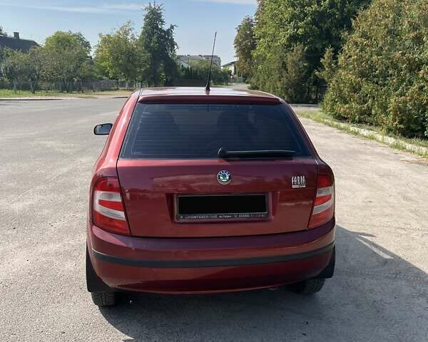 Красный Шкода Фабия, объемом двигателя 1.2 л и пробегом 253 тыс. км за 3750 $, фото 27 на Automoto.ua