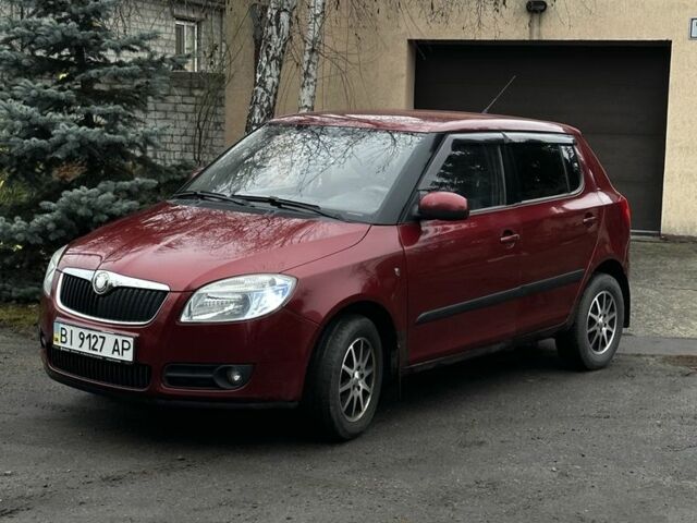 Красный Шкода Фабия, объемом двигателя 1.4 л и пробегом 198 тыс. км за 4500 $, фото 1 на Automoto.ua
