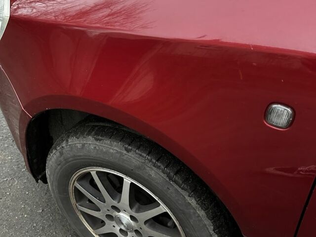 Красный Шкода Фабия, объемом двигателя 1.4 л и пробегом 198 тыс. км за 4500 $, фото 7 на Automoto.ua