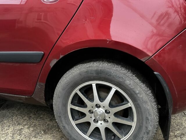 Красный Шкода Фабия, объемом двигателя 1.4 л и пробегом 198 тыс. км за 4500 $, фото 12 на Automoto.ua