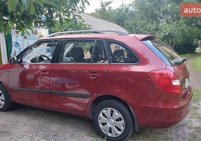 Красный Шкода Фабия, объемом двигателя 1.4 л и пробегом 42 тыс. км за 7850 $, фото 10 на Automoto.ua