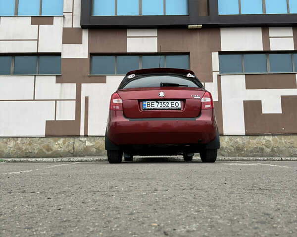 Красный Шкода Фабия, объемом двигателя 1.6 л и пробегом 203 тыс. км за 6300 $, фото 2 на Automoto.ua