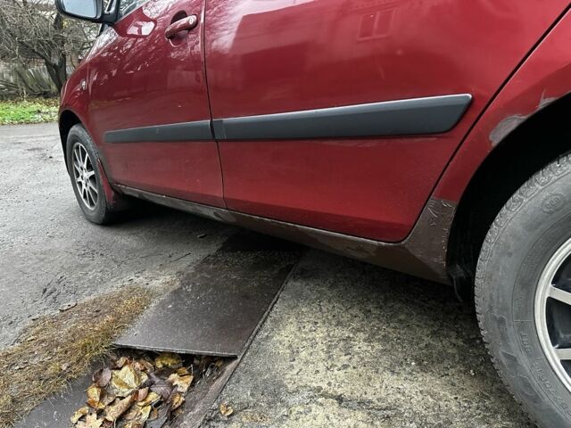 Красный Шкода Фабия, объемом двигателя 1.4 л и пробегом 198 тыс. км за 4500 $, фото 13 на Automoto.ua