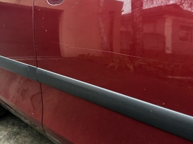 Красный Шкода Фабия, объемом двигателя 1.4 л и пробегом 198 тыс. км за 4500 $, фото 10 на Automoto.ua