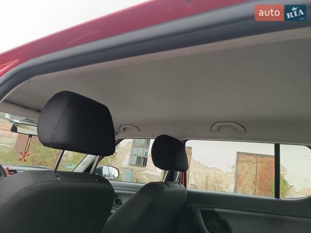 Красный Шкода Фабия, объемом двигателя 1.39 л и пробегом 185 тыс. км за 5450 $, фото 10 на Automoto.ua