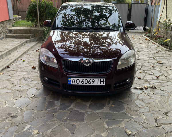 Красный Шкода Фабия, объемом двигателя 1.2 л и пробегом 148 тыс. км за 4250 $, фото 5 на Automoto.ua