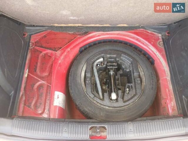 Красный Шкода Фабия, объемом двигателя 1.6 л и пробегом 226 тыс. км за 4999 $, фото 8 на Automoto.ua