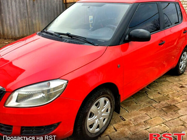 Красный Шкода Фабия, объемом двигателя 1.2 л и пробегом 190 тыс. км за 5500 $, фото 1 на Automoto.ua