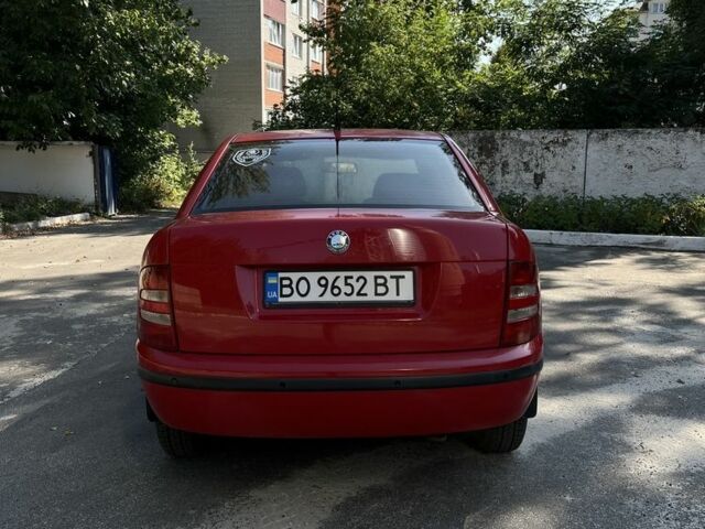 Красный Шкода Фабия, объемом двигателя 1.2 л и пробегом 219 тыс. км за 2600 $, фото 11 на Automoto.ua