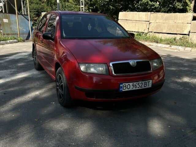 Красный Шкода Фабия, объемом двигателя 1.2 л и пробегом 219 тыс. км за 2900 $, фото 3 на Automoto.ua