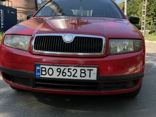 Красный Шкода Фабия, объемом двигателя 1.2 л и пробегом 219 тыс. км за 2600 $, фото 2 на Automoto.ua