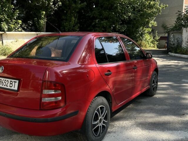 Красный Шкода Фабия, объемом двигателя 1.2 л и пробегом 219 тыс. км за 2600 $, фото 12 на Automoto.ua