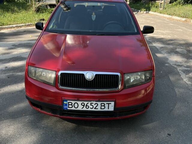 Красный Шкода Фабия, объемом двигателя 1.2 л и пробегом 219 тыс. км за 2600 $, фото 4 на Automoto.ua