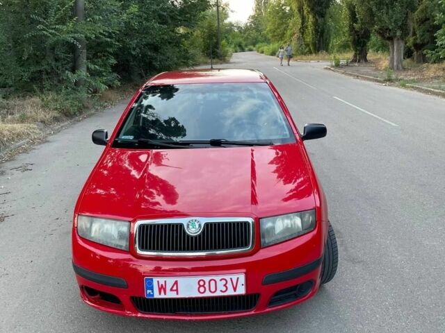 Красный Шкода Фабия, объемом двигателя 1.2 л и пробегом 252 тыс. км за 1800 $, фото 3 на Automoto.ua