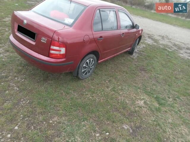 Красный Шкода Фабия, объемом двигателя 1.39 л и пробегом 245 тыс. км за 3300 $, фото 2 на Automoto.ua