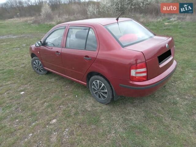 Красный Шкода Фабия, объемом двигателя 1.39 л и пробегом 245 тыс. км за 3300 $, фото 1 на Automoto.ua