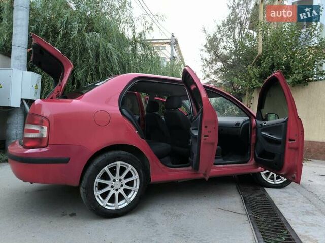 Красный Шкода Фабия, объемом двигателя 1.39 л и пробегом 274 тыс. км за 3800 $, фото 9 на Automoto.ua