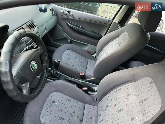 Червоний Шкода Фабія, об'ємом двигуна 1.4 л та пробігом 200 тис. км за 2850 $, фото 5 на Automoto.ua