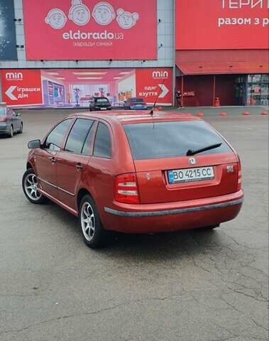 Красный Шкода Фабия, объемом двигателя 1.39 л и пробегом 214 тыс. км за 3900 $, фото 7 на Automoto.ua