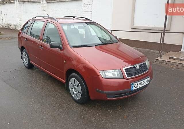 Красный Шкода Фабия, объемом двигателя 1.2 л и пробегом 214 тыс. км за 3800 $, фото 6 на Automoto.ua