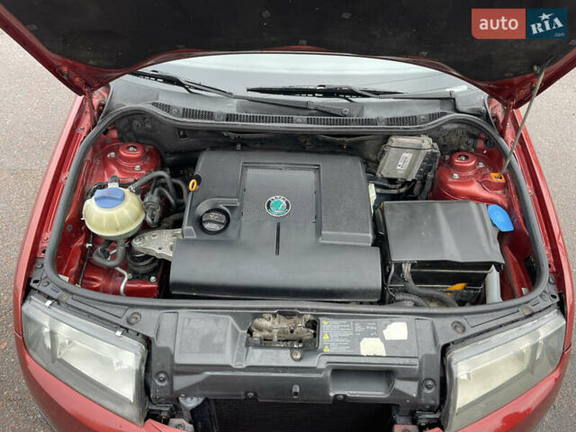 Красный Шкода Фабия, объемом двигателя 1.2 л и пробегом 217 тыс. км за 3550 $, фото 28 на Automoto.ua