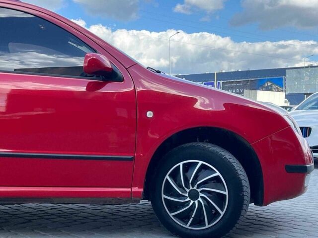Красный Шкода Фабия, объемом двигателя 1.4 л и пробегом 282 тыс. км за 4890 $, фото 10 на Automoto.ua