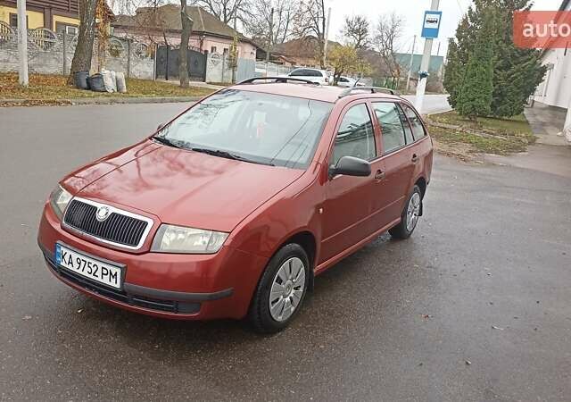 Красный Шкода Фабия, объемом двигателя 1.2 л и пробегом 214 тыс. км за 3800 $, фото 4 на Automoto.ua