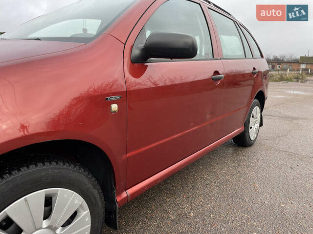 Красный Шкода Фабия, объемом двигателя 1.2 л и пробегом 217 тыс. км за 3550 $, фото 14 на Automoto.ua