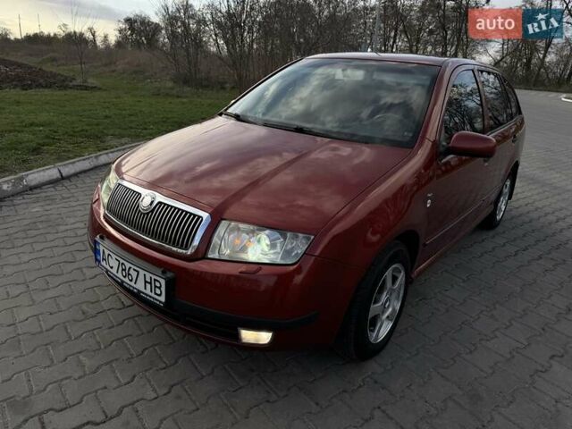 Красный Шкода Фабия, объемом двигателя 1.39 л и пробегом 258 тыс. км за 4000 $, фото 4 на Automoto.ua