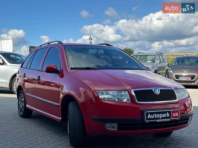 Красный Шкода Фабия, объемом двигателя 1.4 л и пробегом 282 тыс. км за 4890 $, фото 3 на Automoto.ua