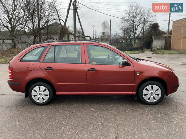 Красный Шкода Фабия, объемом двигателя 1.2 л и пробегом 217 тыс. км за 3550 $, фото 6 на Automoto.ua