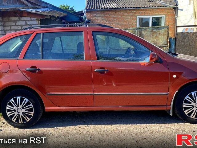 Красный Шкода Фабия, объемом двигателя 1.4 л и пробегом 200 тыс. км за 3600 $, фото 4 на Automoto.ua