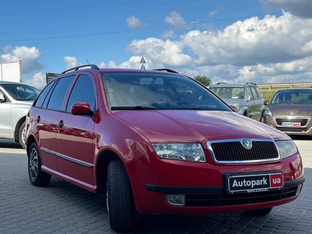 Красный Шкода Фабия, объемом двигателя 1.4 л и пробегом 282 тыс. км за 4890 $, фото 2 на Automoto.ua