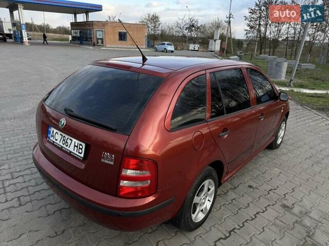 Красный Шкода Фабия, объемом двигателя 1.39 л и пробегом 258 тыс. км за 4000 $, фото 5 на Automoto.ua
