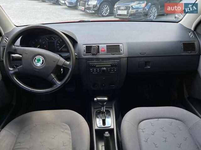 Красный Шкода Фабия, объемом двигателя 1.4 л и пробегом 282 тыс. км за 4890 $, фото 26 на Automoto.ua