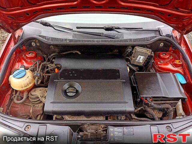 Красный Шкода Фабия, объемом двигателя 1.4 л и пробегом 225 тыс. км за 4300 $, фото 13 на Automoto.ua