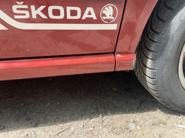 Красный Шкода Фабия, объемом двигателя 1.4 л и пробегом 238 тыс. км за 4350 $, фото 4 на Automoto.ua