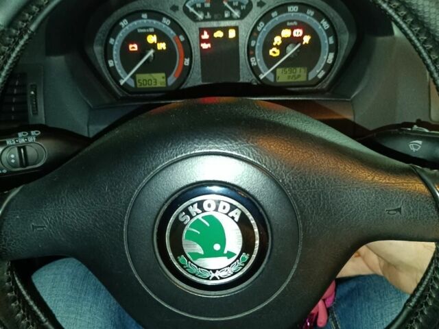 Червоний Шкода Фабія, об'ємом двигуна 1.4 л та пробігом 159 тис. км за 3830 $, фото 12 на Automoto.ua