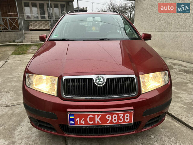 Красный Шкода Фабия, объемом двигателя 1.4 л и пробегом 169 тыс. км за 4200 $, фото 3 на Automoto.ua
