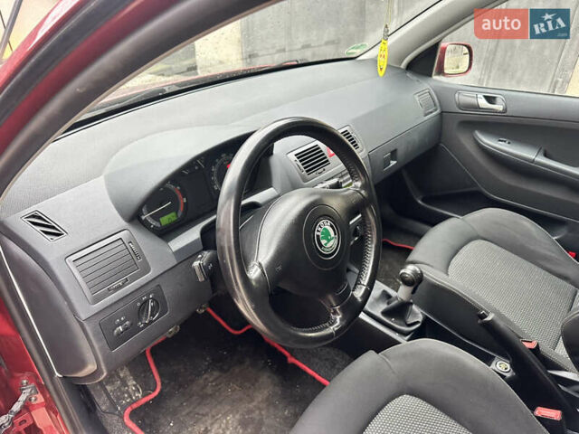 Красный Шкода Фабия, объемом двигателя 1.4 л и пробегом 169 тыс. км за 4200 $, фото 7 на Automoto.ua