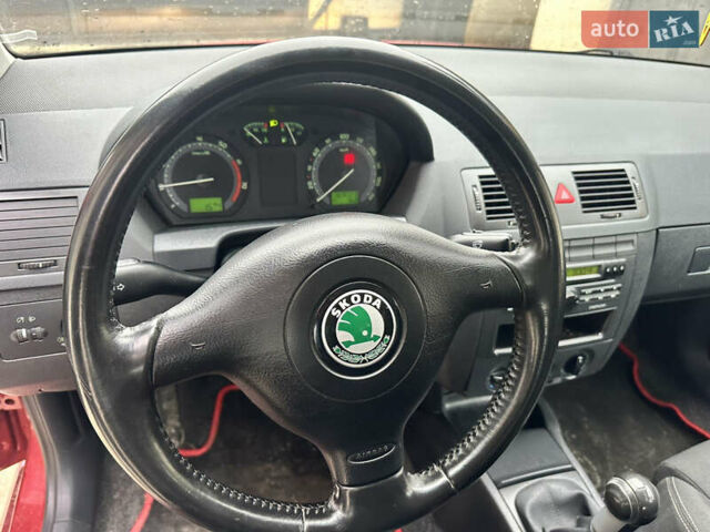 Красный Шкода Фабия, объемом двигателя 1.4 л и пробегом 169 тыс. км за 4200 $, фото 8 на Automoto.ua