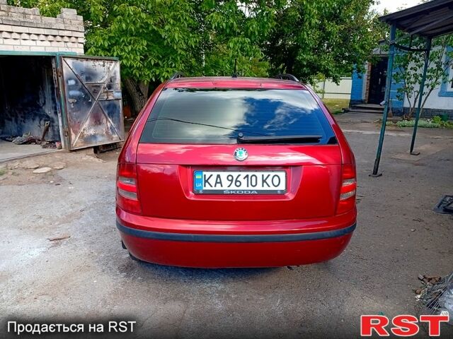Шкода Фабія 2005 у Первомайськ на Automoto.ua Червоний Шкода Фабія, об'ємом двигуна 1.2 л та пробігом 240 тис. км за 3500 $, фото 3 на Automoto.ua