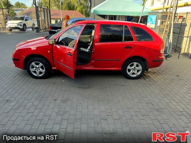 Червоний Шкода Фабія, об'ємом двигуна 1.2 л та пробігом 289 тис. км за 4000 $, фото 4 на Automoto.ua