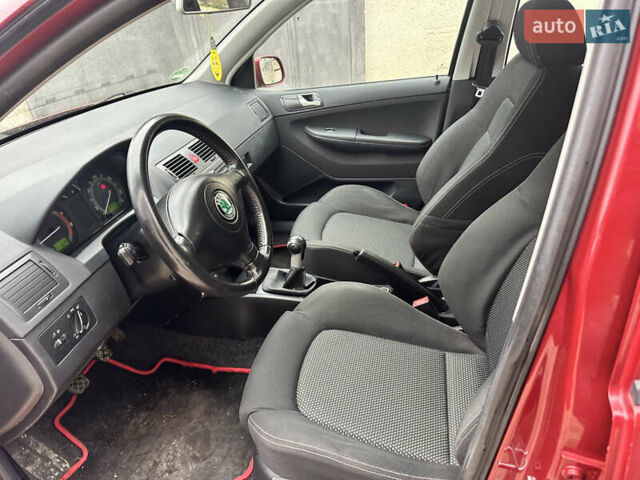 Красный Шкода Фабия, объемом двигателя 1.4 л и пробегом 169 тыс. км за 4200 $, фото 13 на Automoto.ua