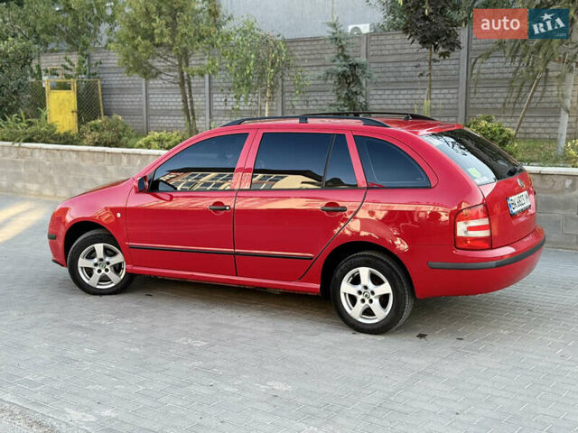 Красный Шкода Фабия, объемом двигателя 1.39 л и пробегом 241 тыс. км за 4399 $, фото 6 на Automoto.ua