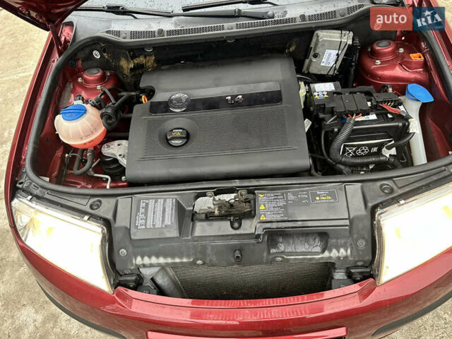 Красный Шкода Фабия, объемом двигателя 1.4 л и пробегом 169 тыс. км за 4200 $, фото 4 на Automoto.ua